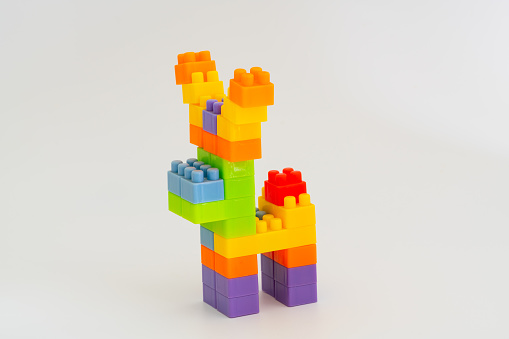 The deer is built with rainbow toy bricks. Children's educational toys