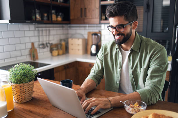 istock Freelancer sitting at home, blogging 1277730824