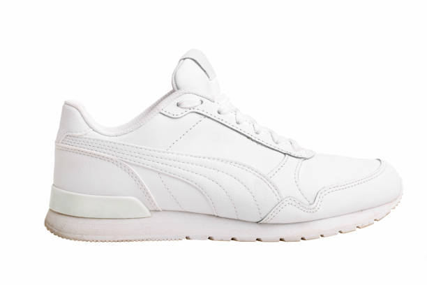 istock Women's leather white sneakers 1277731222