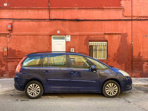 Valencia, Spain - September 30, 2020: A blue Citroen car model C4 Picasso parked in the street. This car was produced by the French manufacturer from 2006 until 2018