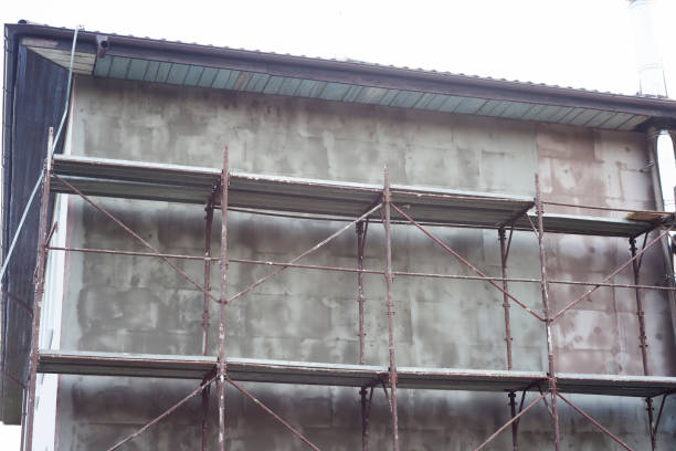 istock house renovation from exterior, scaffolding 1277735257