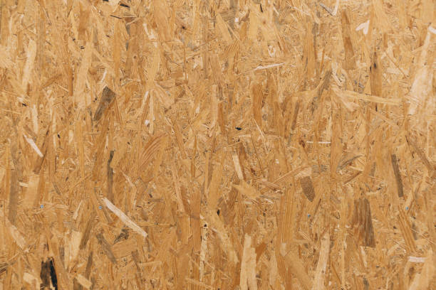 istock Oriented strand board. A close-up of a board made of pressed sawdust. 1277736077