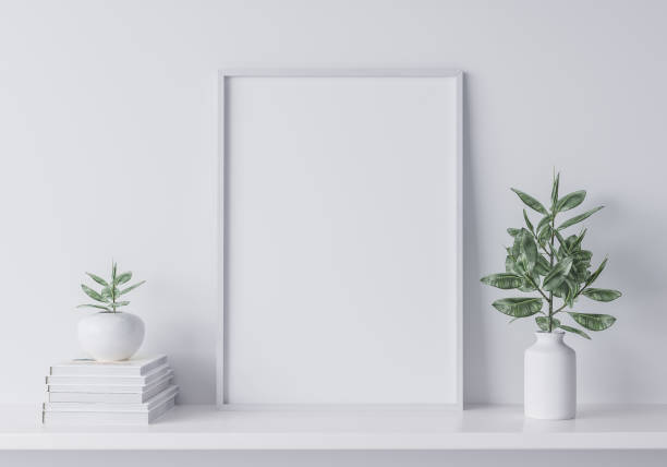 istock White mock up frame in modern interior, close up for white frame and plants on shelf, minimal design. Stock photo 1277739576