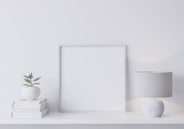 istock White mock up frame in modern interior, close up for square frame and plants on shelf, minimal design. Stock photo 1277739839