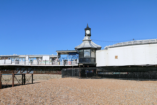 Blankenberge, West-Flanders, Belgium-September 30, 2023: restaurant beach hut on the pier seen from German bridge pier that will be soon demolished for ever