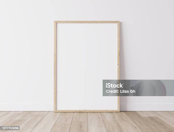Vertical Wooden Frame Standing On Parquet Floor With White Background Minimal Frame Mock Up Interior Stock Photo - Download Image Now