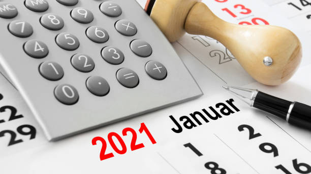 istock Calendar and calculator and German: January 2021 1277743058