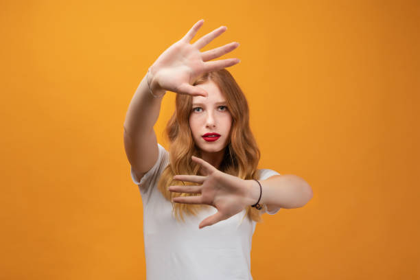 istock Image of serious woman gestures actively hands at camera. No way, stop doing 1277744377