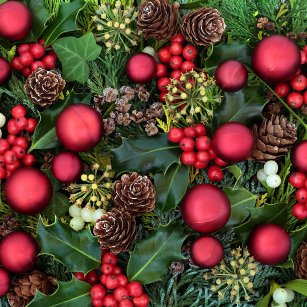 istock Decorative Christmas Background with Baubles & Winter Greenery 1277746925