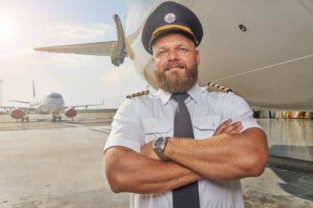 istock Optimistic man at work in the airport standing alone 1277750434