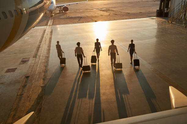 istock Team of professional pilots and stewardesses ready for work 1277750441