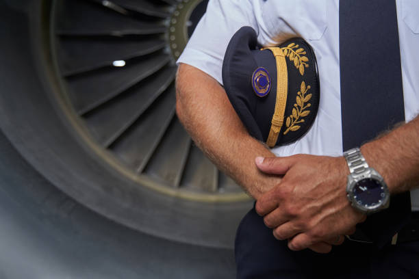 Peak cap of professional airman at work