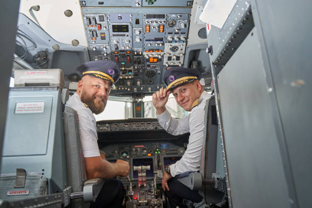 istock View of the flight deck and two friendly pilots in it 1277750501