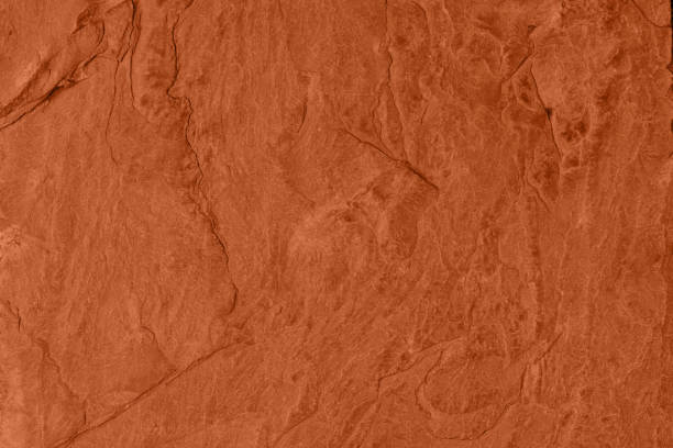 istock Saturated dark orange low contrast Concrete textured background 1277751738