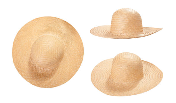 istock Pretty straw hat with ribbon and bow on white background. Beach hat top view isolated 1277752592