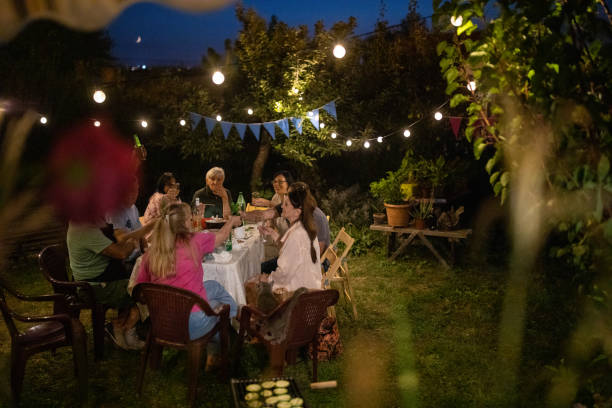 istock Old friends having fun time on birthday party at backyard 1277754012