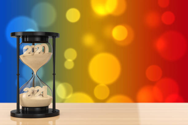 istock New 2020 Year Concept. Sand Falling in Hourglass Taking the Shape from 2020 to 2021 year. 3d Rendering 1277760134