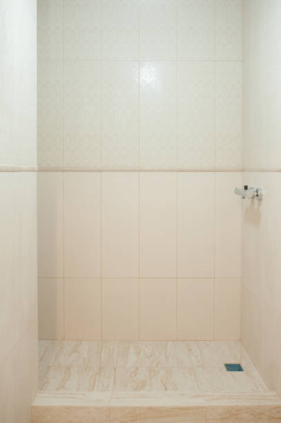 istock Bathroom, open shower, beige tiles, renovation concept. 1277765865