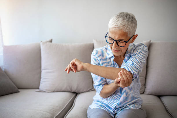 Elbow Pain In An Elderly Person.
