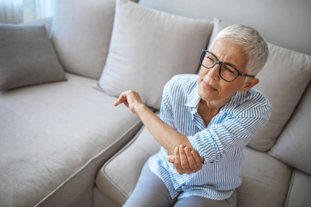 istock Elbow Pain In An Elderly Person. 1277767659