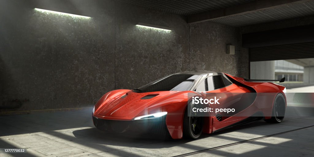 Generic Red Sports Car Parked In Empty Garage A generic luxury red sports car, with headlights on, having just parked in an empty concrete / industrial garage space with roller shutter door, which is still partially up revealing out of focus background. Light stream in through a rood window with slight dusty haze. Sports Car Stock Photo