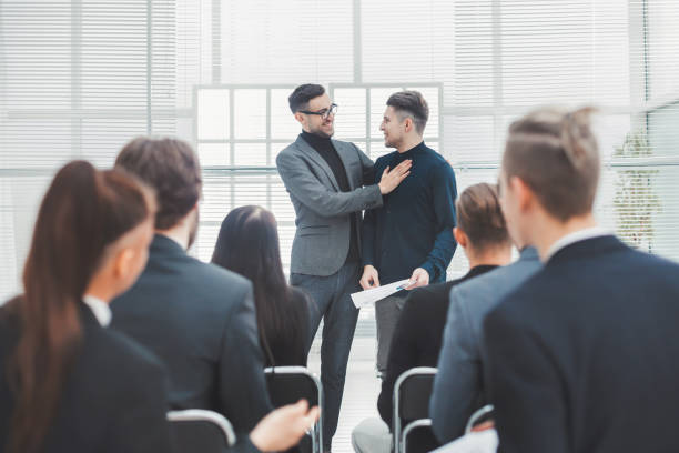 istock project Manager introducing a new employee.business concept 1277772689