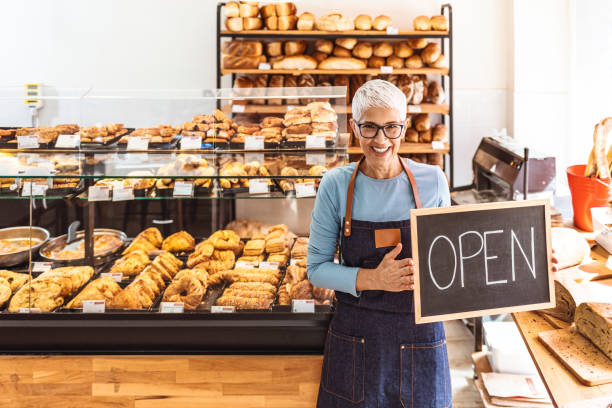 istock Open sign in a small business shop 1277772834