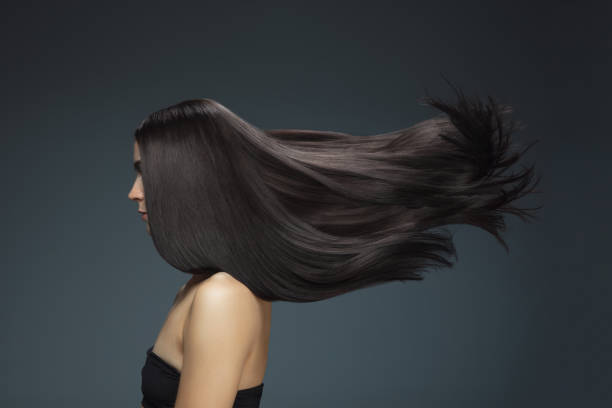 istock Beautiful model with long smooth, flying brunette hair 1277774022