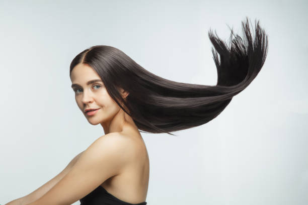 istock Beautiful model with long smooth, flying brunette hair 1277774058
