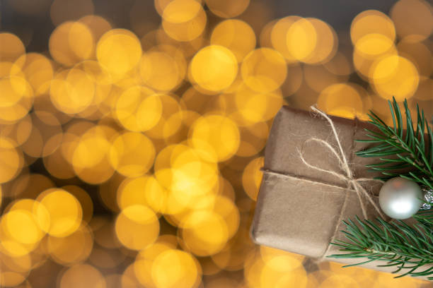 istock Blurred image. Gift box on a blurred background. Merry Christmas and happy new year concept. 1277775784