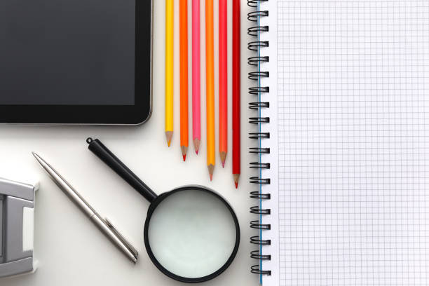 istock Tablet pc and set of pencil on worktable closeup background 1277779473