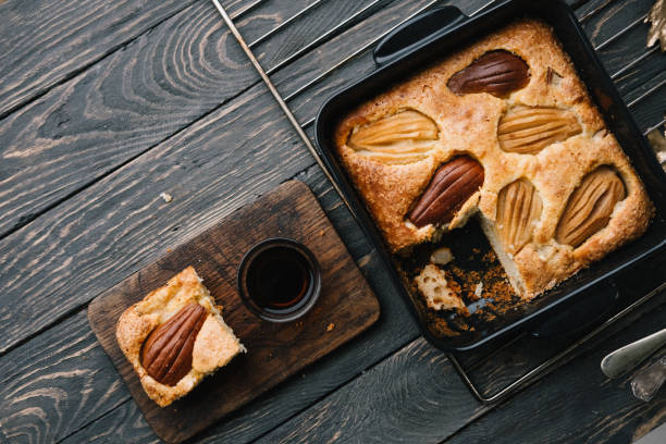 Fall french pear cake in a black ceramic bakeware