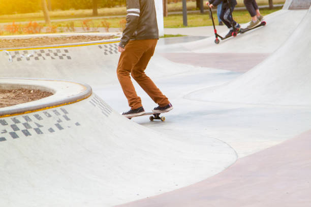 istock Young man practising on skateboard in skate park 1277786814