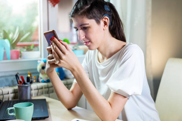 istock Beautiful young woman with cochlear implant 1277787180
