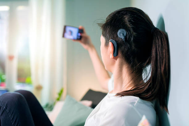 istock Beautiful young woman with cochlear implant 1277787215