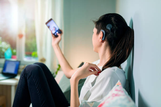 istock Beautiful young woman with cochlear implant 1277787217