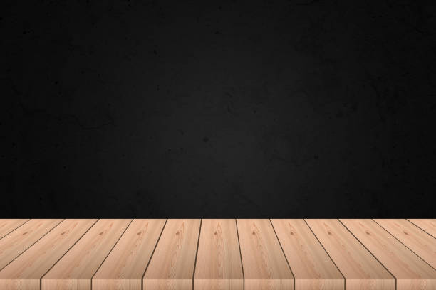 istock wooden table with black background - For product display. 1277787442