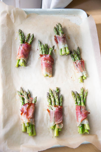 istock Prosciutto wrapped asparagus spears 1277788352