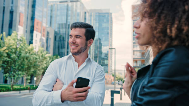 istock Multi ethnic friends catching an Uber in the city center. Using mobile app 1277788415