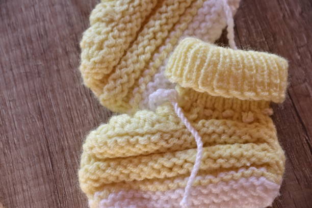 istock Homemade knitted baby booties 1277788558
