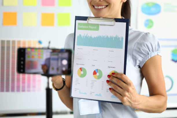 istock Female hand hold business chart closeup 1277789137