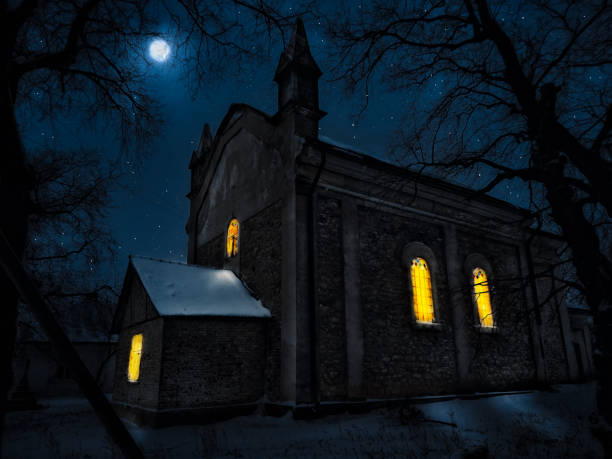 istock Ancient mysterious church at night in the moonlight. 1277792233