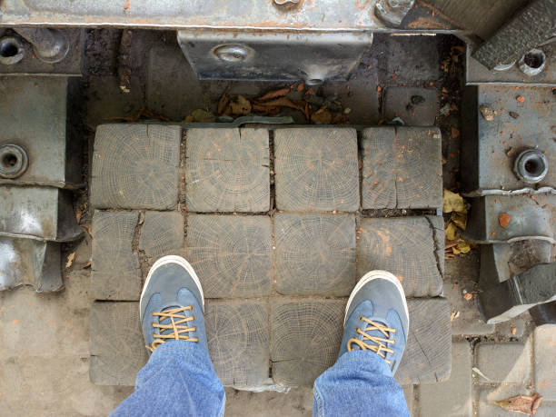istock Feet on wooden slats. 1277794586