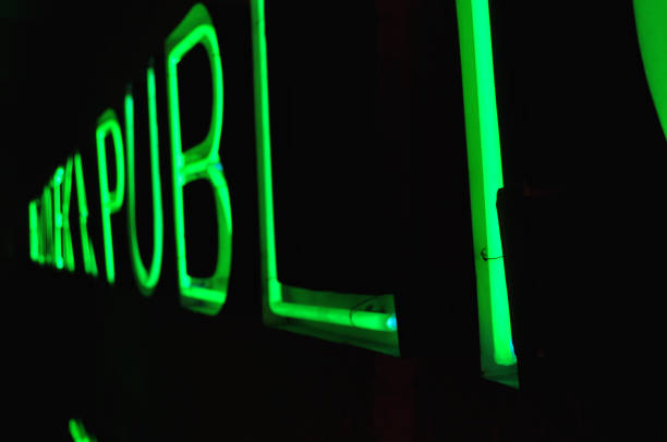 istock neon signboard on the wall light decoration green 1277795045