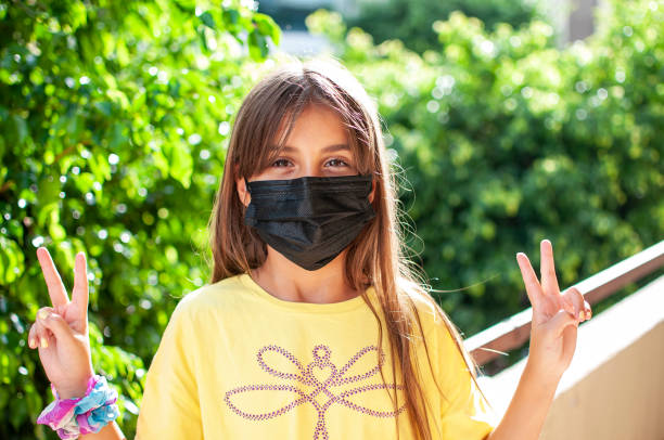 istock Portrait of a girl posing a protective mask 1277796464