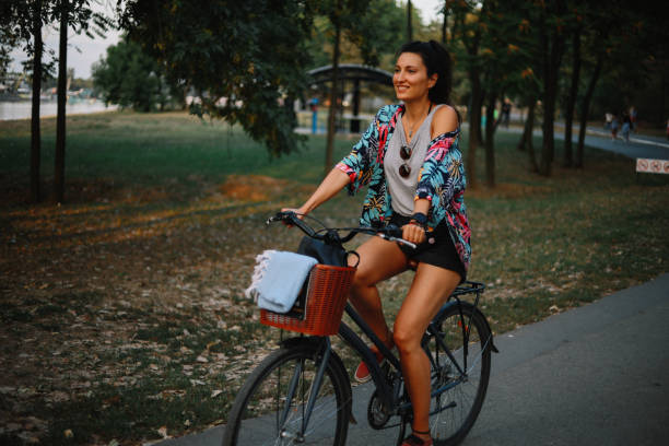 istock Commuting on a bicycle in through the city park 1277797636