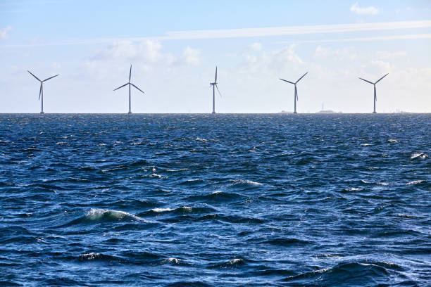 istock Row of offshore wind turbines. 1277806186