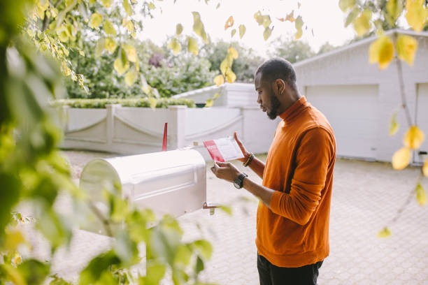 istock African-American man receiving voting ballot 1277806194