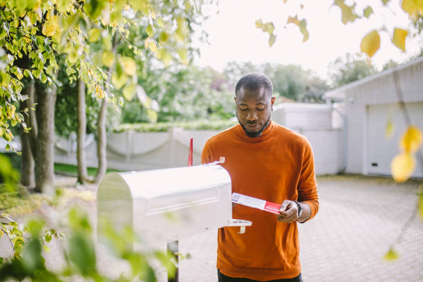 istock African-American man receiving voting ballot 1277806195