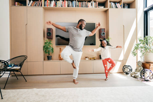 istock Favourite dancing activity with parents. Dad and daughter dancing together 1277806255